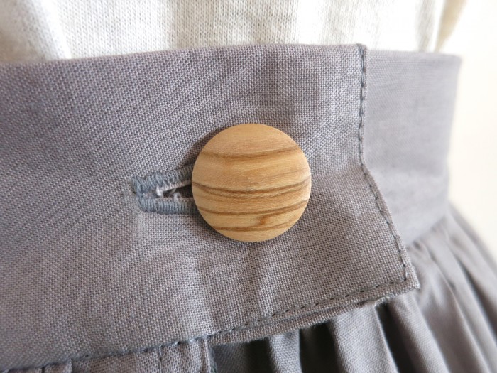 Wooden button detail.